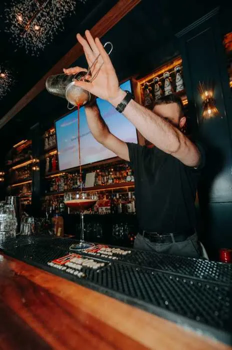 Bartender pouring